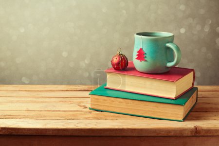 Tea cup and ball on books