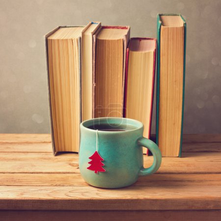 Tea cup and old books