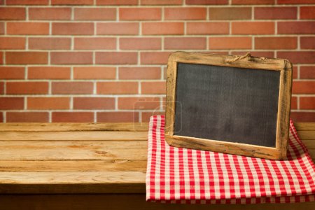 Chalkboard on checked tablecloth