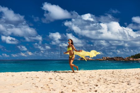 Woman with sarong  at beach