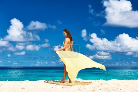 Woman with sarong at beach