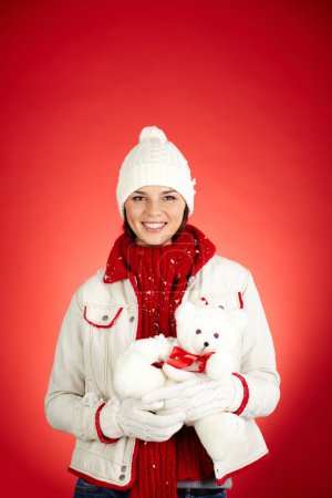 Girl with white teddy bear