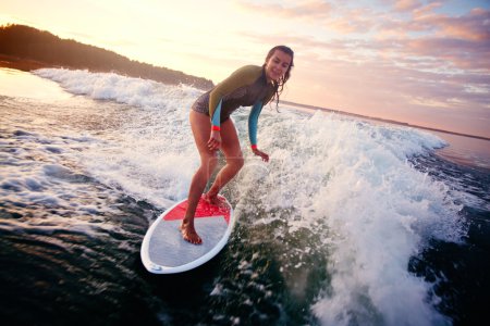 Woman on surfboard