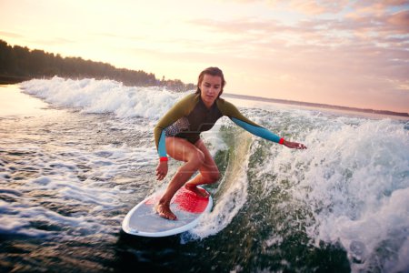 Woman surfboarding
