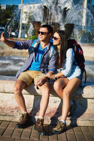 Man and woman taking selfy