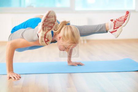 Girl doing yoga exercise