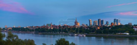 Warsaw, Poland - May 25, 2016: Sunset in the center of Capital City with skyscrapers and historical old town