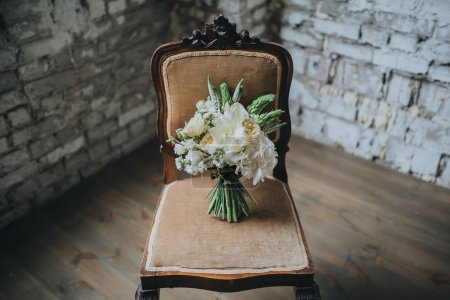 Bridal bouquet on vintage chair