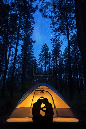 Couple  romantic evening in a camping