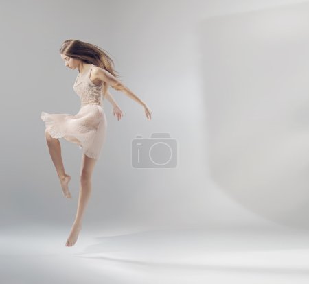 Talented young jumping ballet dancer 