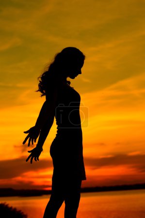 Silhouette of the beautiful mother