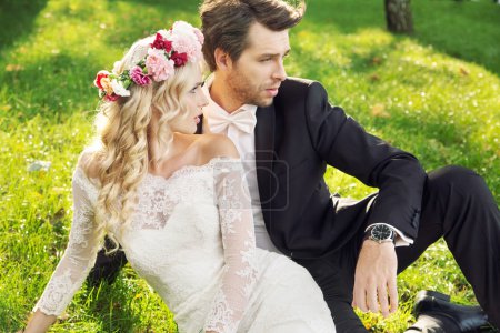 Alluring wife with her handsome groom