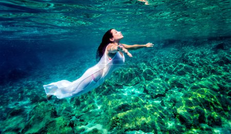 Beautiful woman relaxing in the water