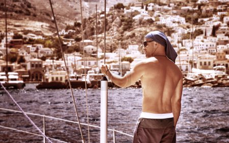 Sexy man on sailboat