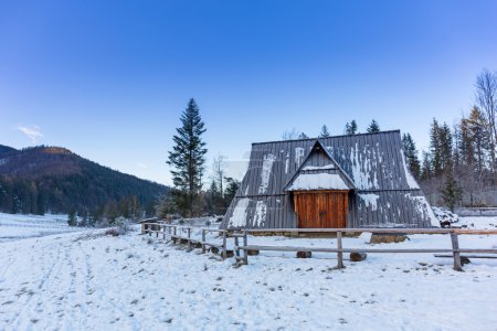 Wooden shelter in snowy Tatra mountains