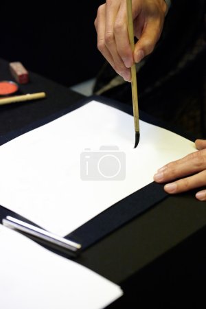 Chinese painting and calligraphy on white paper