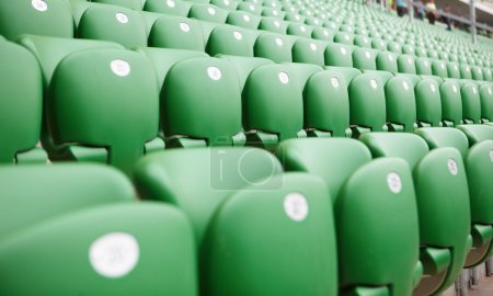 Safety plastic armchairs on stadium tribune
