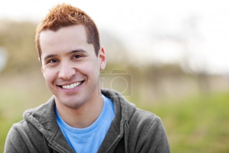 Mixed race man smiling