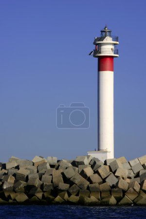 Lighthouse over blue sky in Spain
