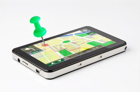 Travel destination, green pin stuck in a GPS device