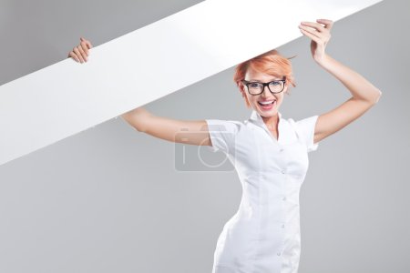Happy woman with white board