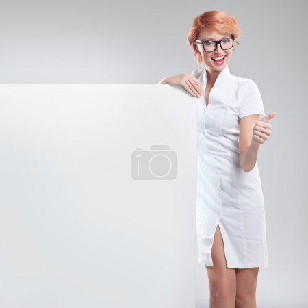 Happy smiling woman with white board