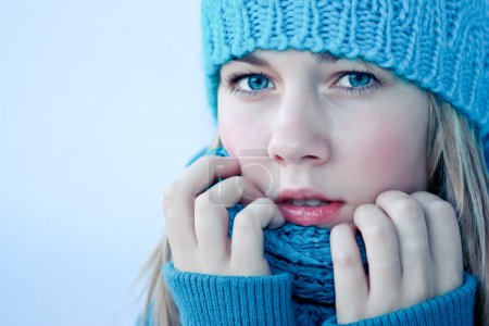 Beautiful girl in winter clothes