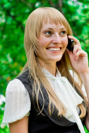 Business woman portrait at outdoors talking cell phone