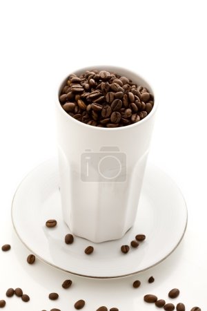 Coffee Beans inside a white glass on white isolated background