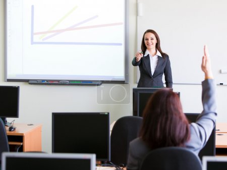 Corporate trainning - woman presenting