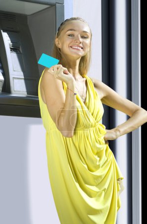 Happy woman with plastic card
