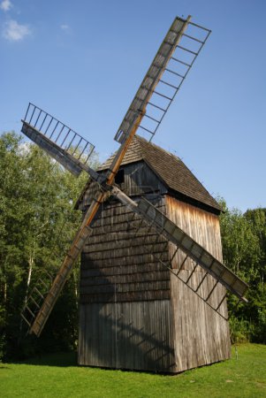 Old windmill on grass
