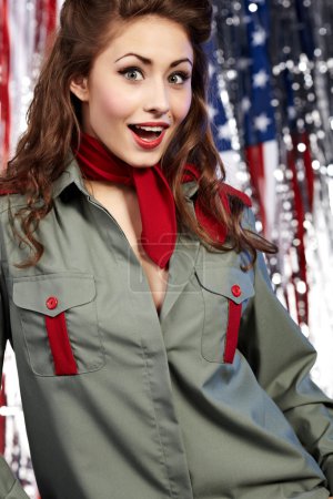 Sexual pinup woman in military clothing