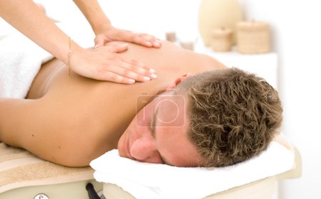 Young man getting a massage
