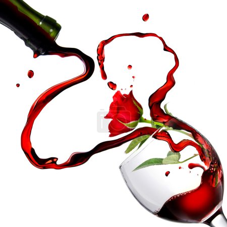 Heart from pouring red wine in goblet
