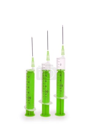 Three syringes isolated on the white