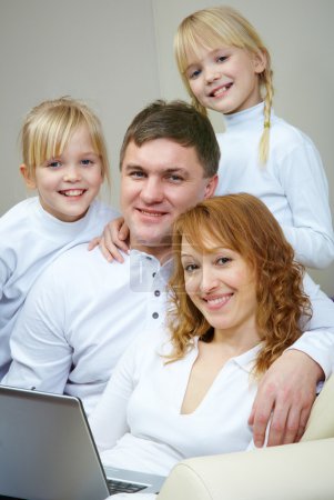 Family with computer