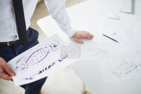 Businessman with sketch in hand