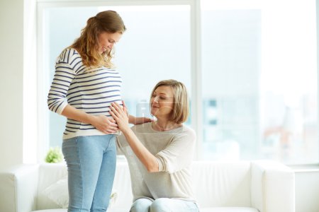 Pregnant woman and her mother