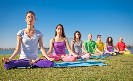 Group of young have meditation on yoga class.