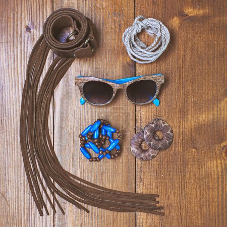 Fashion accessories on wooden background