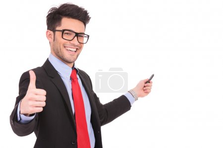 business man shows thumbs up & points