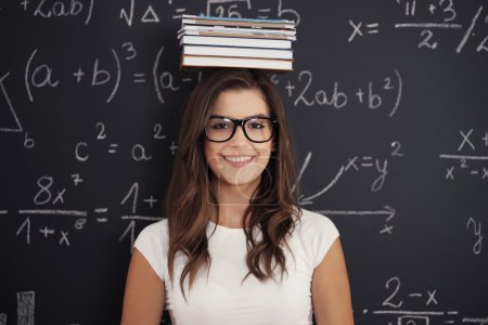 Female student thinking about mathematics problem