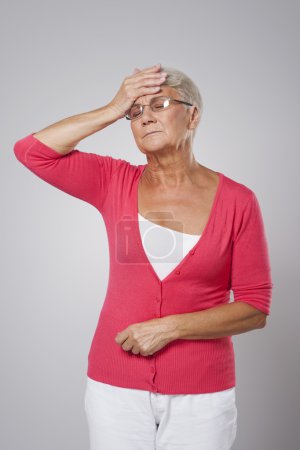Senior woman with high fever
