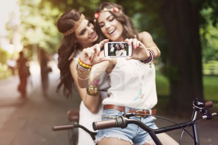 Hippie girls taking selfie