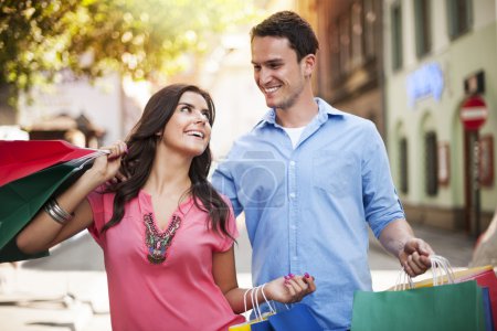Young couple enjoying shopping together