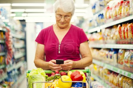 Senior woman at supermarket