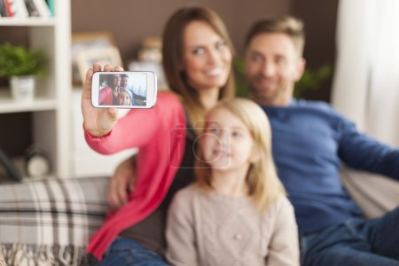 Family taking selfie together
