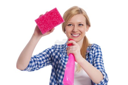 Young blonde female holding a cleaning equipment