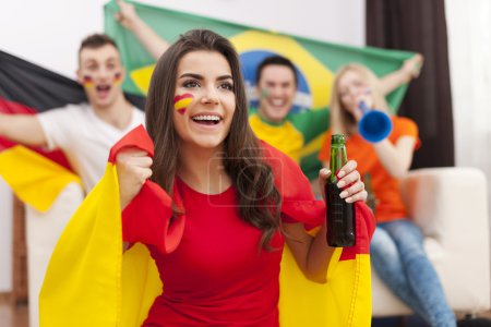 Spanish girl cheering football match